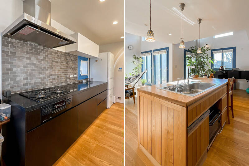 壁側にアクセントタイルが貼られたⅡ型のキッチン。木製のアイランドキッチンはダイニングテーブルも兼ねていて、まるで家具とキッチンが融合したような特別感のある造りです。