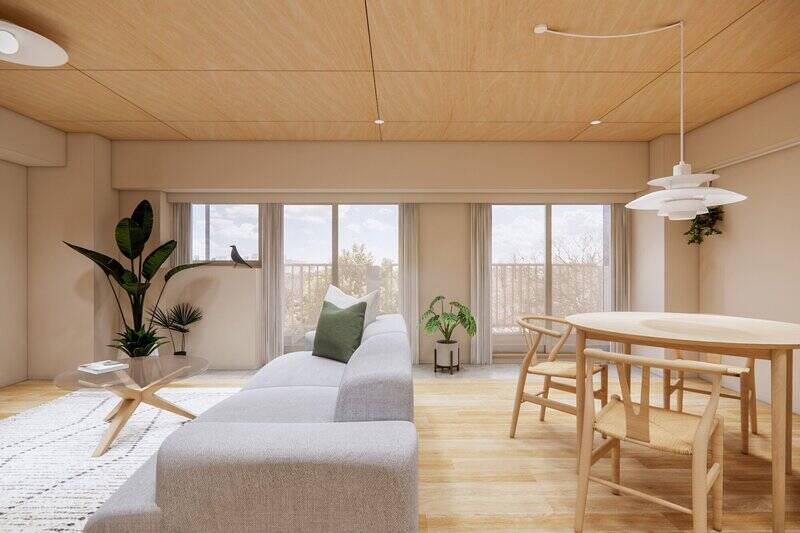 クロスは淡いグレー、床はオークの突板、天井にはシナ合板が貼られてナチュラルな雰囲気。全体的に淡いトーンなので、外のグリーンがよく映えます。