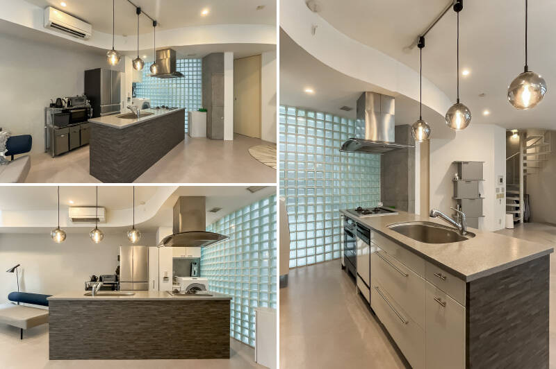 <b>左</b>・キッチンはアイランドタイプ。背面には冷蔵庫置き場と洗濯機置き場が並んでおり、家事動線がスムーズです。/<b>右・</b>本体は3口コンロタイプで、大型の食洗機を内蔵。フラットな天板で、料理のサーブや片付けがしやすそう。