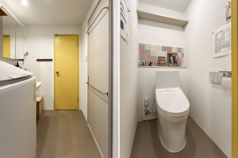 洗面室から、トイレとバスルームへアクセスします。黄色の扉の先はトイレです。