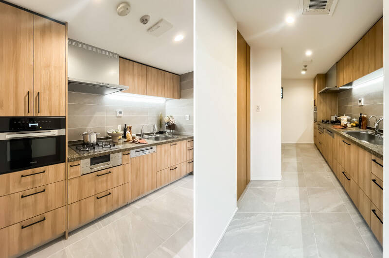 大型の食洗機やオーブンレンジを搭載。生活感の出やすい冷蔵庫置き場前に袖壁があるのもうれしい。