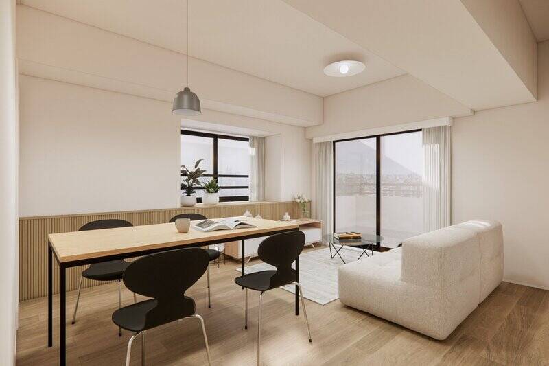 広さは約14帖（キッチンを含む）。南東向きのバルコニー北東向きの出窓に面する、二面採光の明るい空間です。