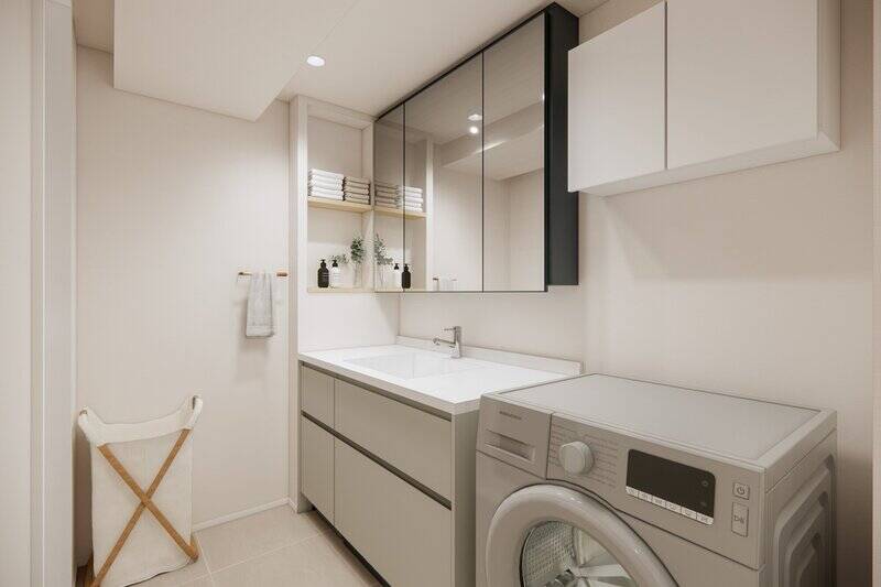 洗面室は脱衣スペースを無理なく兼ねられる広さ。洗面台は黒×グレーの配色で、横にはニッチ収納を設けます。