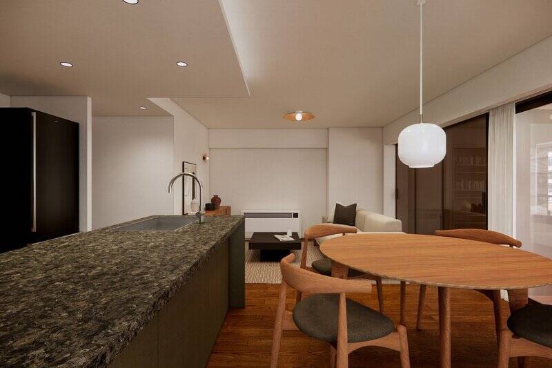 リビングとダイニングのスペースを緩くゾーニングできる広さ。リビングスペース側の壁には、印象的なブラケットライトを設置します。