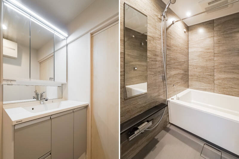 洗面脱衣室(左)と、隣にあるバスルーム(右)。いずれもすっきりとしたスタンダードな仕様です。バスルームは浴室換気乾燥機が付いた1418サイズで、小さなお子さまと一緒でも楽に入れそう。