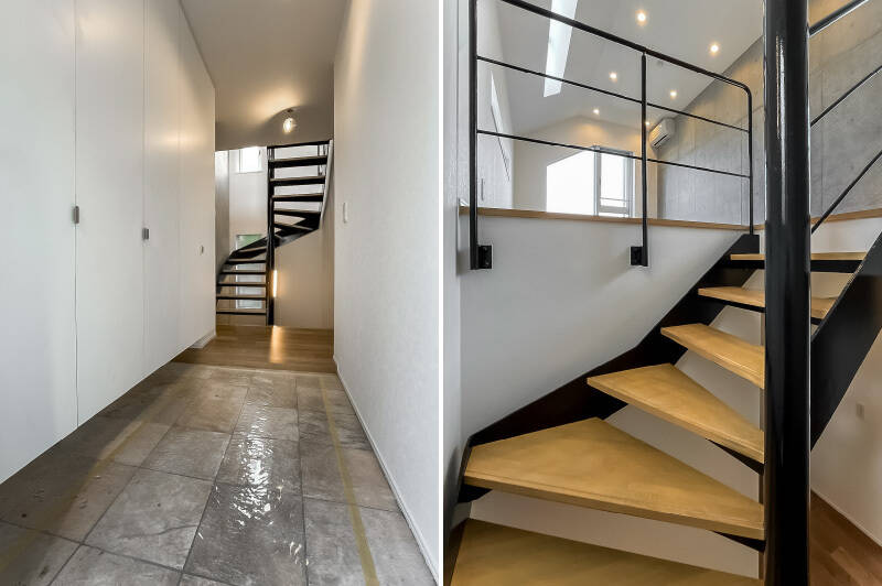 玄関は1階部分に位置します。玄関扉を背にして左手にはシューズボックスがズラリと並び、靴以外のアイテムも収納できそう。同じフロアには後ほどご紹介する洋室Ａもありますが、まずは螺旋階段を上がります。