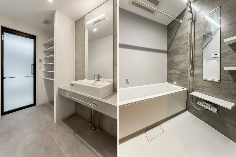 <b>左・</b>洗面室はコンクリートの色味とあわせてグレーで揃えた、スタイリッシュなデザイン。洗面台横には可動棚（6段分）があり、タオルなどを収納しやすそう。／<b>右・</b>浴室乾燥機・追焚き機能付きのユニットバス。
