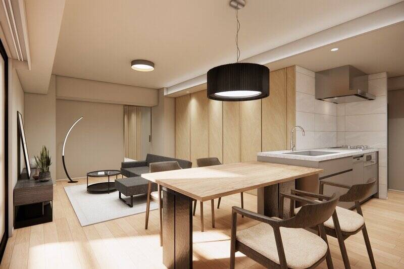 リビングダイニングには両開きタイプの収納を2箇所設置。木製パネルの壁と一体化しており、整って見える印象です。