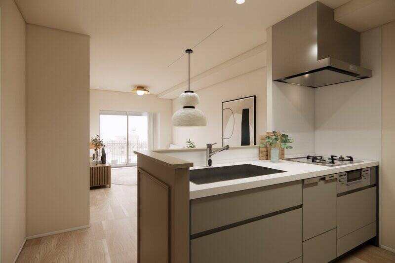 キッチンは3口コンロタイプで食洗機付き。散らかりやすい手元が、リビングダイニングから見えづらい造りです。