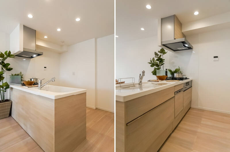 食洗機、浄水器一体型水栓が備わっているシステムキッチン。背面には食器棚を置くスペースもあります。料理をしながらふと前を見ると、キッチンからも窓からの緑が見えますよ。