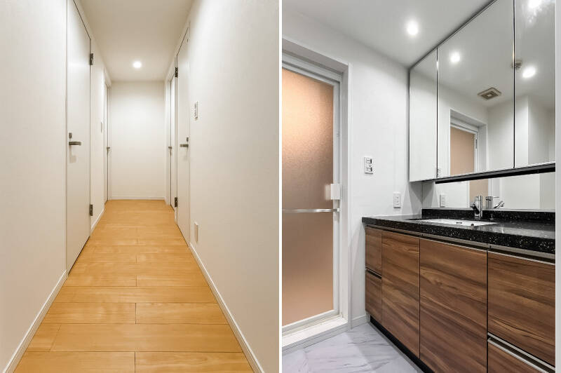 <b>左・</b>手前ふたつが水まわりへと続く扉、奥ふたつが洋室B、Cへと続く扉です。／<b>右・</b>ブラックのカウンタートップでシックな印象の洗面化粧台。対面に洗濯機置き場があります。