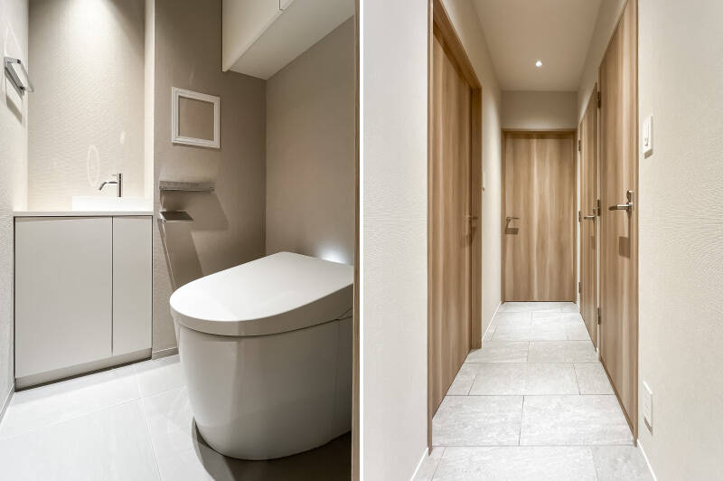 <p><b>左・</b>トイレは廊下からアクセスする間取り。シンプルなタンクレスタイプで、吊り戸棚と独立手洗い器が備わっています。／<b>右・</b>廊下の建具は木目調で統一されています。</p>