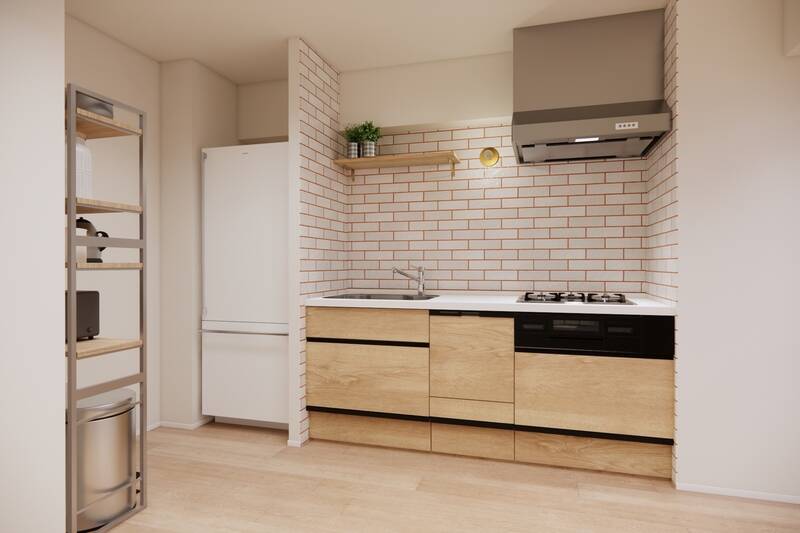 3口コンロ・食洗機付きのキッチンはフローリングの色味と合わせた木調の面材を使用。冷蔵庫置き場の対面に、調理家電などの置き場としてラックを設置するのがよさそう。