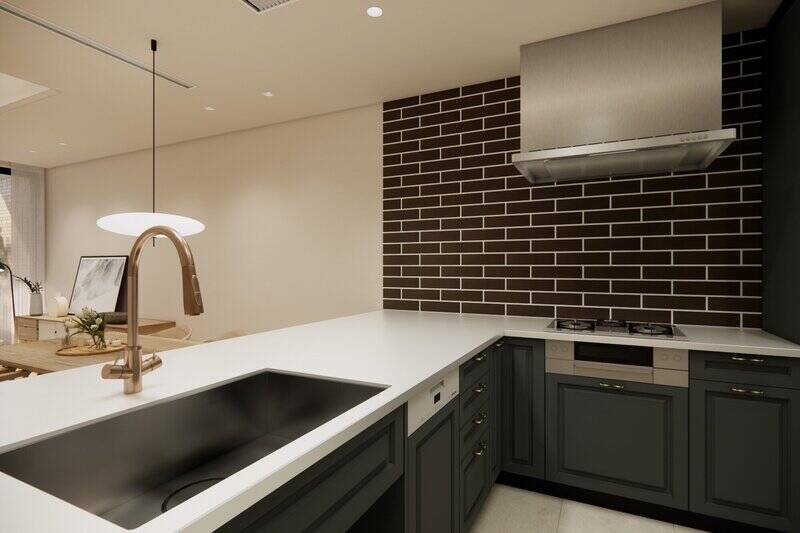 キッチンは壁のサブウェイタイルやモールディング、レッドゴールド色の水栓などが印象的なデザイン。コンロは3口タイプで、フロントオープン型の食洗機を標準搭載しています。