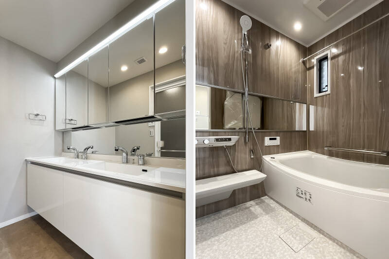 洗面室と浴室へはLDKからアクセス。洗面台は2ボウル仕様で、忙しい朝でもふたり並んで身支度できますよ。1418サイズのユニットバスには、浴室乾燥機と窓を備えています。