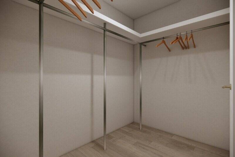 ふたり分の衣類を収めても余白がありそうな、大型のウォークインクローゼット（WIC）付きです。