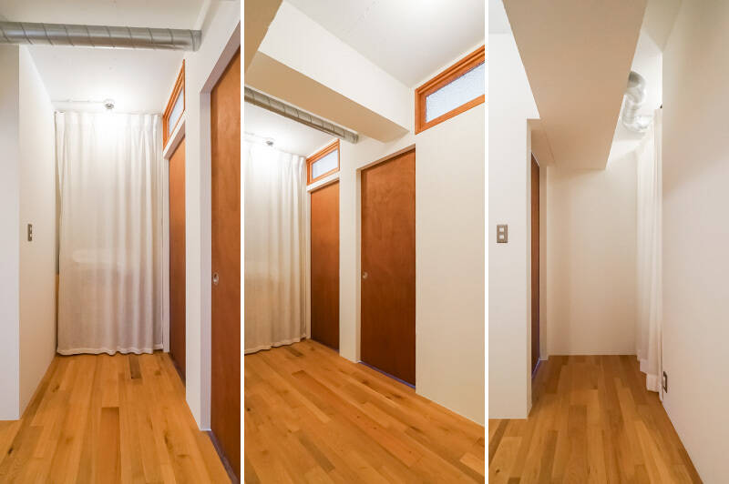 <p>こちらは玄関から左へ進んだ、廊下の突き当たり部分です。<b>左・</b>カーテンで仕切られた中には収納スペースがあり、大きな荷物なども置くことができます。／<b>中央・</b>洋室Bへとつながる2枚の扉。将来的に居室を2つに分けられるよう、あらかじめ設計されています。／<b>右・</b>洋室Cの扉の向かいには、カーテンで仕切れる収納スペースがあります。</p>