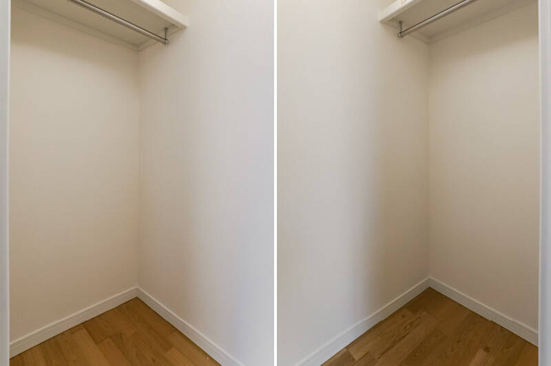 出入り口とは別の扉を開けてみると、そこにはウォークインクローゼット（WIC）が。ハンガーパイプがふたつ付いています。