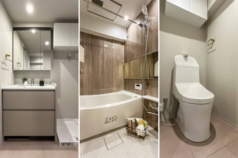 <p><b>左・</b>洗面台はカウカモのオリジナル。キッチンと同じ色味で統一感がありますよ。洗濯機置き場の上部には棚が備わっています。/<b>中央・</b>ユニットバスは浴室乾燥機付きの1216サイズ。/<b>右・</b>トイレは吊り戸棚付き。金物には、洗面まわりとお揃いの真鍮素材を採用しました。</p>