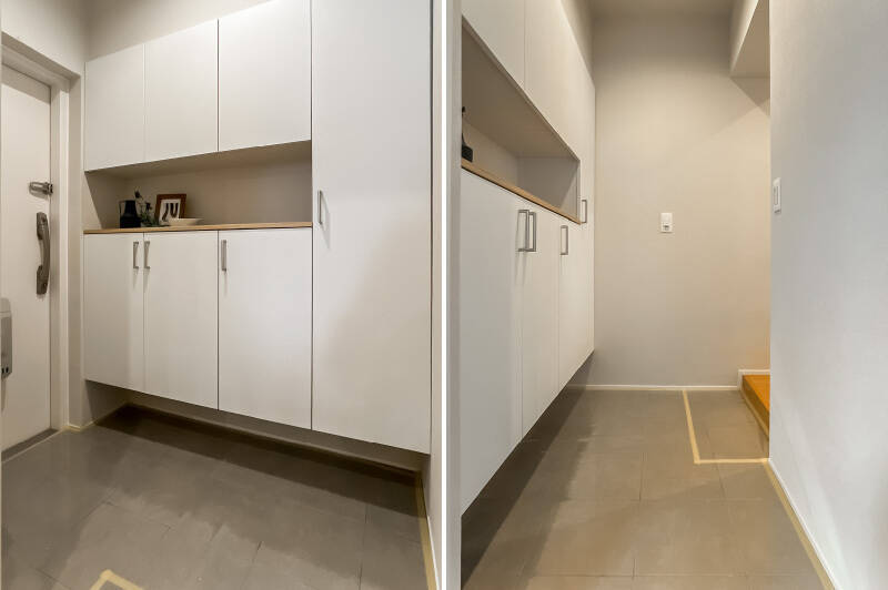空間を広く見せるフロートタイプの靴収納を設置。玄関扉に合わせ白で統一された玄関まわりは、パッと明るく清潔感ある印象です。