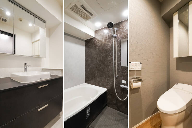 <b><b>左・</b></b>洗面化粧台の天板にはゆとりがあり、小物を置くスペースとしても重宝しそう。／<b><b>中央・</b></b>浴室乾燥機付きのユニットバスもモノトーンで揃えられ、統一性を感じます。／<b><b>右・</b></b>トイレは手洗いボウル付きで、吊り戸棚も備わっています。