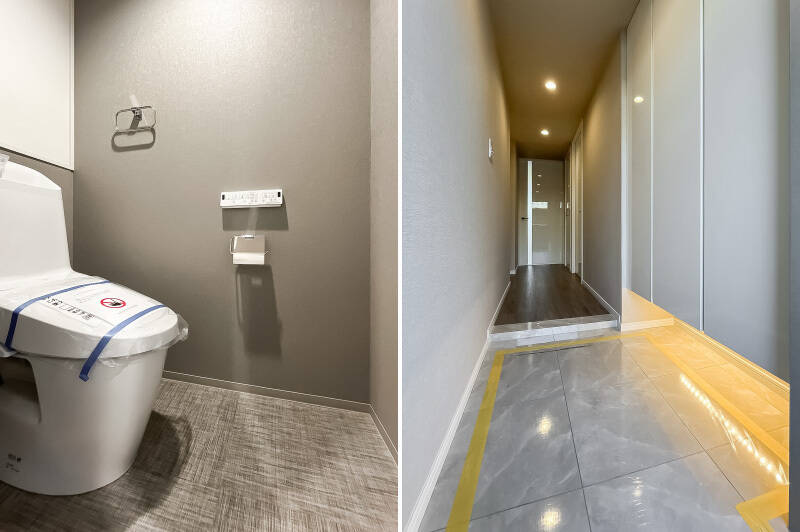 <b>左・</b>廊下沿いにあるトイレ。洗面脱衣室と同じ床材が使われています。／<b>右・</b>間接照明が足元を照らす玄関。下足入れは扉3枚分用意されています。