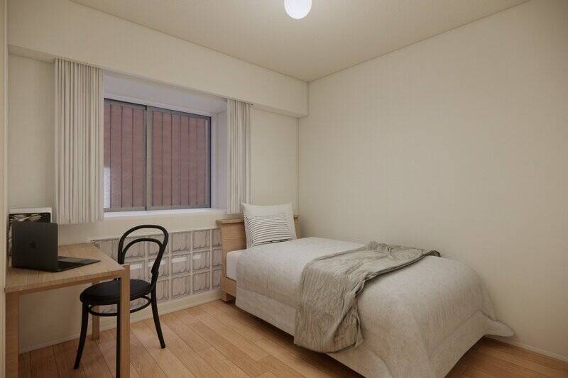 洋室Bは、共用廊下側のポーチに面しています。窓の下にガラスブロックがある、ちょっと珍しいデザインです。