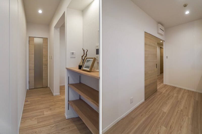 <b>左・</b>LDKから廊下への動線中には、スポットライト付きのディスプレイカウンターと物入れ（白い扉）が備わっています。物入れは奥行きたっぷりで、掃除機などの置き場にちょうどよさそう。／<b>右・</b>キッチン背後のスペースからも、ダイレクトに廊下へアクセスできます。ふた通りの動線が確保されていると、家事の効率がアップしそうですよね。