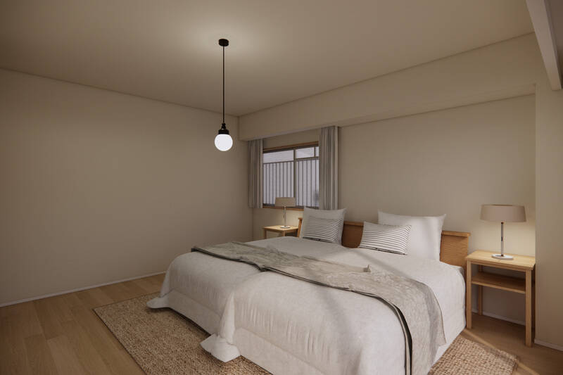 シングルベッド2台とベッドサイドテーブルを置いても余裕がある広さ。