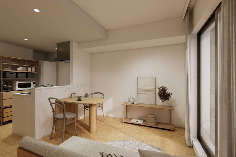 キッチンの腰壁には大理石調のタイルをあしらい、空間のポイントに。