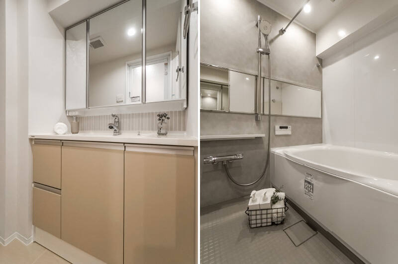 <b>左・</b>ナチュラルな色味の洗面化粧台。壁面の一部にはタイルがあしらわれています。／<b>右・</b>バスルームは1317サイズ。浴室乾燥機付きです。