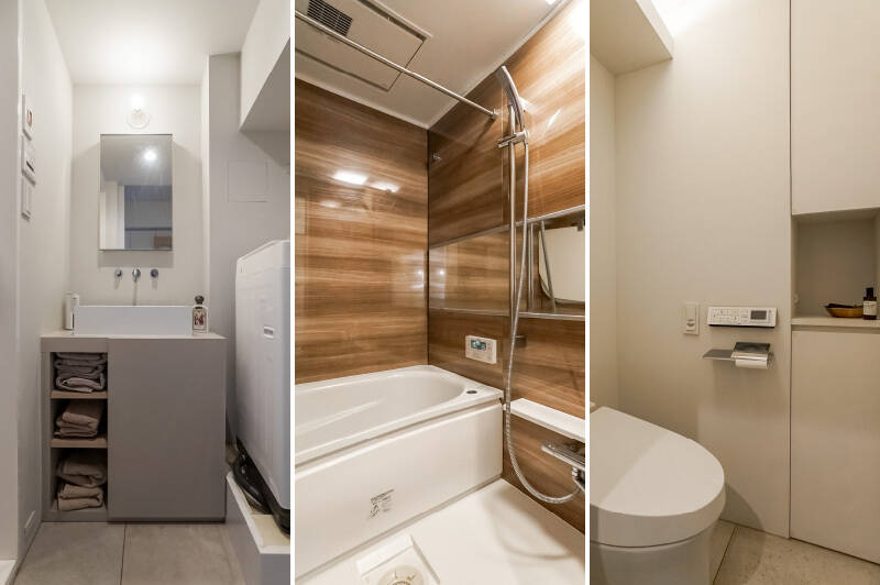 <b><b>左・</b></b>洗面台もグレートーン。ベッセルボウルがホテルライクで素敵。／<b><b>中央・</b></b>ユニットバスは1416サイズ。／<b><b>右・</b></b>洗面室からアクセスするトイレ。間接照明が仕込まれており、これまたホテルライクさを感じます。