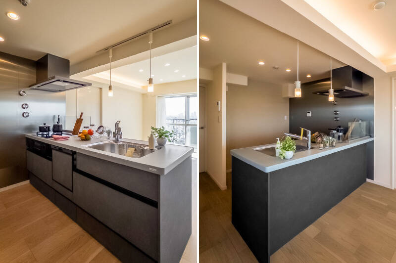 キッチンはグレーの面材が空間を引き締めるアクセントに。3口コンロタイプで、食洗機を完備しています。