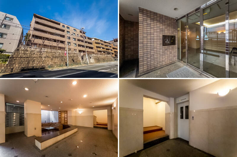 坂道の途中に建つ、堂々とした佇まいのマンション。入口にはスロープがなく、一部階段を下がる必要があります。エントランスにはオートロック付き。その先の共用ロビーには、ソファセットが設えられたラウンジスペースがありますよ。