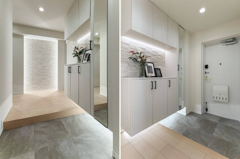 <b>左・</b>玄関正面には、間接照明が入った壁面が。アートを飾ると映えそうな空間です。／<b>右・</b>フロートタイプの下足入れが備わっています。