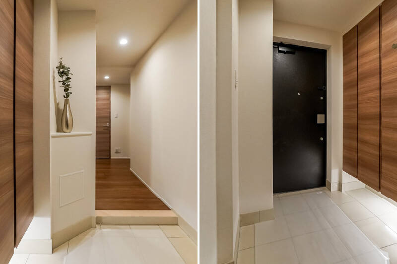 タイル貼りの床、足元の間接照明、飾り棚など、随所にホテルっぽさを感じる玄関。共用部との調和を感じます。