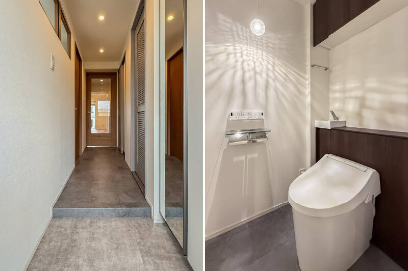 <b>左・</b>洋室Cにつながる室内窓や、リビングのガラス入り建具越しに光が届く明るい廊下。玄関には姿見付きのシューズボックスを設置済みです。／<b>右・</b>トイレはコンパクトな手洗い器付きで、スペースにややゆとりがあります。