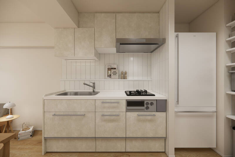 キッチンは、LDKのインテリアにうまく溶け込みそうな上品なデザイン。壁付けタイプにすることで、リビングスペースをより広く使えるよう配慮しています。