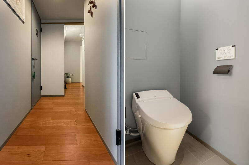 廊下左手に写っているドアの中がトイレ。なお、脱衣所とトイレのドアに付けられた可愛らしいアイコンは、陶芸が趣味のお嬢さまが作られたのだとか。