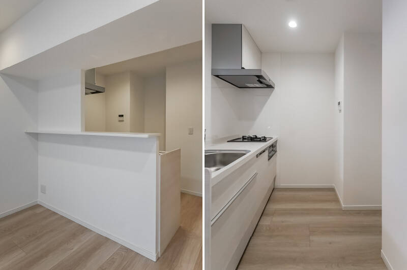 キッチンにはちょっとしたカウンターが設けられています。食洗機が備わり、コンロはふた口。背面には冷蔵庫置き場用の窪みがあります。