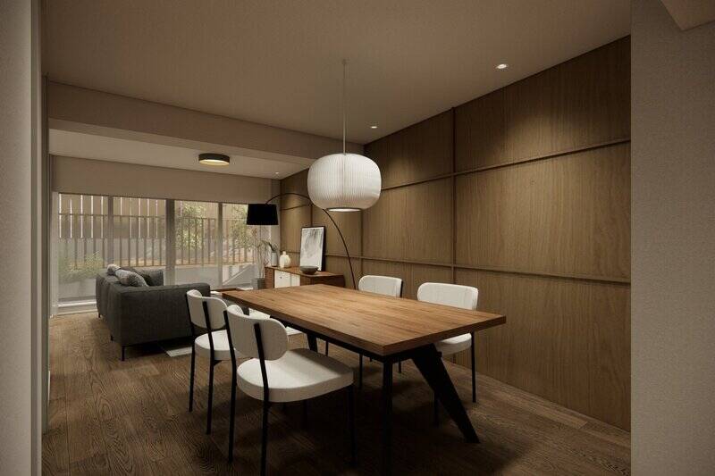 <p>テーマは<b> “都市の中で温度のある暮らし”</b>&nbsp;。家族のオフ時間を演出するため、突板のフローリングをはじめ素材はウォルナット調で揃え、視覚的に温かみのある空間に仕上げます。</p>