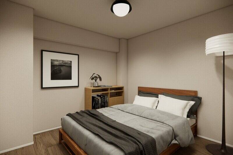 ダブルベッドを置いても、収納棚やフロアライトを置く余白があります。