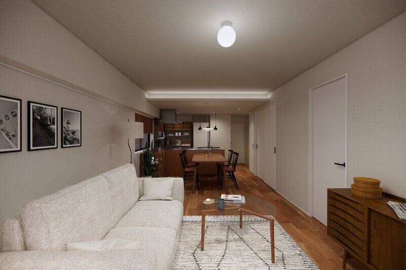 天井には間接照明を配し、室内をやわらかく照らす工夫を。床材には表情豊かなブラックチェリーの突板を使用し、素足でも心地よい質感を大切にしています。