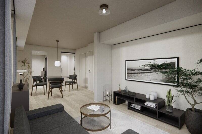 北東・南東向きの窓から光が差し込む空間。ブラックのカーテンレールやピクチャーレールが、グレートーンの空間に力強いアクセントを添えています。