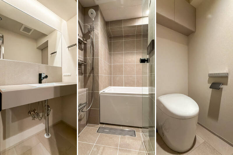 <b>左・</b>素材選びにこだわった、ホテルライクな質感の洗面台。／<b>中央・</b>浴室は在来工法で新設し、躯体の形状を活かした造り。／<b>右・</b>トイレには洗面室からアクセスします。コロンとしたシンプルなタンクレスタイプを採用。