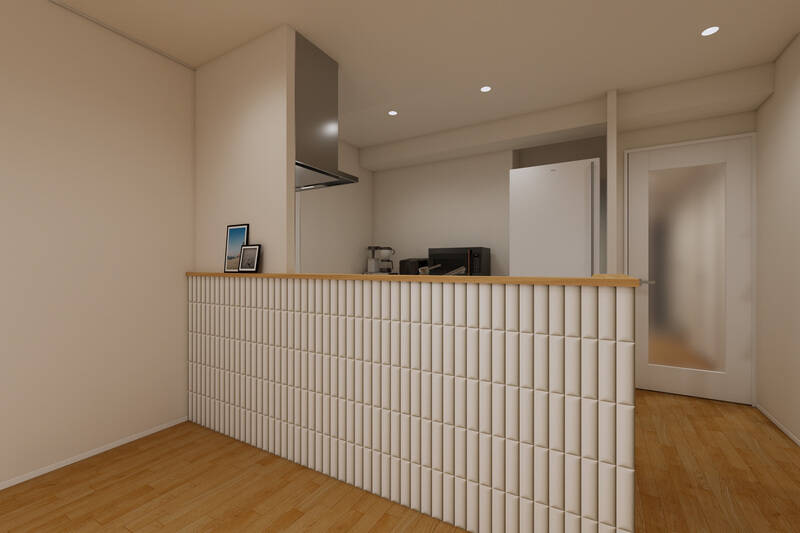 キッチンは丸みを帯びたタイルを採用し、柔らかい印象に。腰壁のおかげでキッチンの内部は見えづらく、生活感を抑えられます。