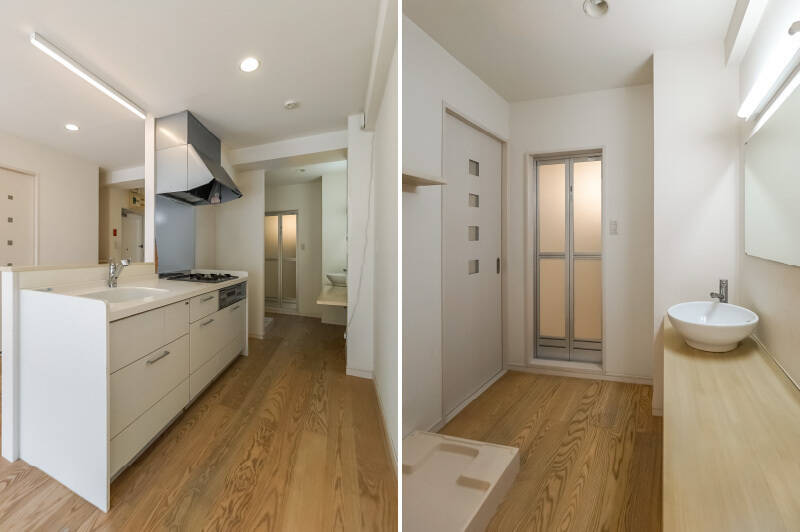 広々とした3口コンロ付きキッチン。奥に進むと洗面脱衣スペースにつながっています。