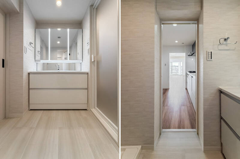 キッチン突き当たりのドアは洗面脱衣室に続いていました。洗濯機置き場もこちらにまとまっているため、ルーフバルコニーまで一直線。家事効率UPです！