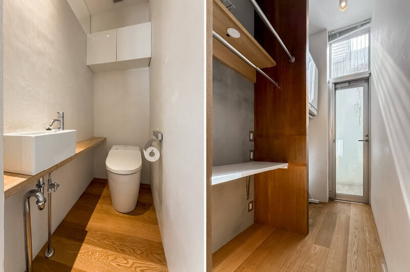 <b>左・</b>独立手洗い器付きのトイレスペース。／<b>右・</b>横並びに配された水まわりの先には、ランドリースペースが。手前側にはハンガーパイプや棚、奥側にはガス式乾燥機が設置されています。